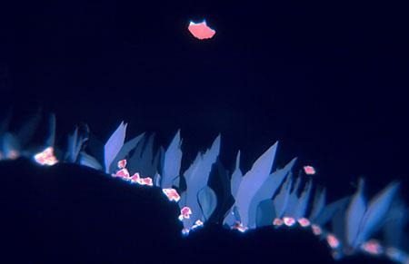 Micrograph of a chain of pale blue blades standing along a curve, with pink flecks above them on a dark blue field.